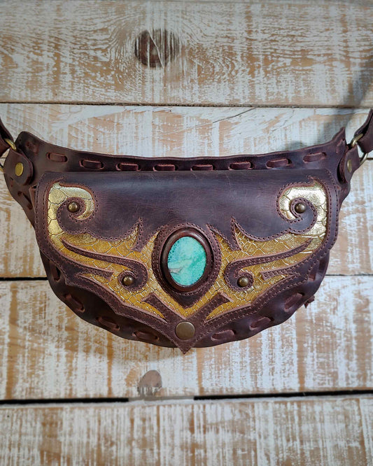 Handmade Bohonito brown leather belt bag with unique tribal artwork and snake skin agate.