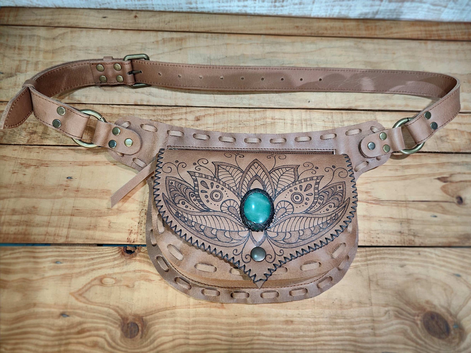 Side view of artisan leather belt bag by Bohonito, featuring hand-crafted pyrography on premium Natural oiled leather with Aventurine stone.