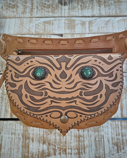 Bohonito tan leather belt bag with detailed Kirtmukha artwork and healing gemstones.