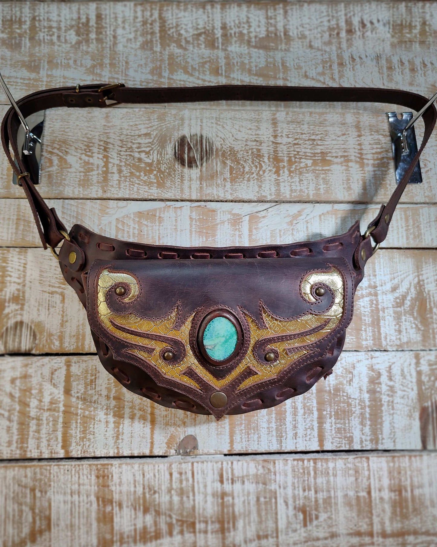 Mini Gautxa waist bag in brown sprinter leather featuring a hand-painted tribal design with a snake skin agate.