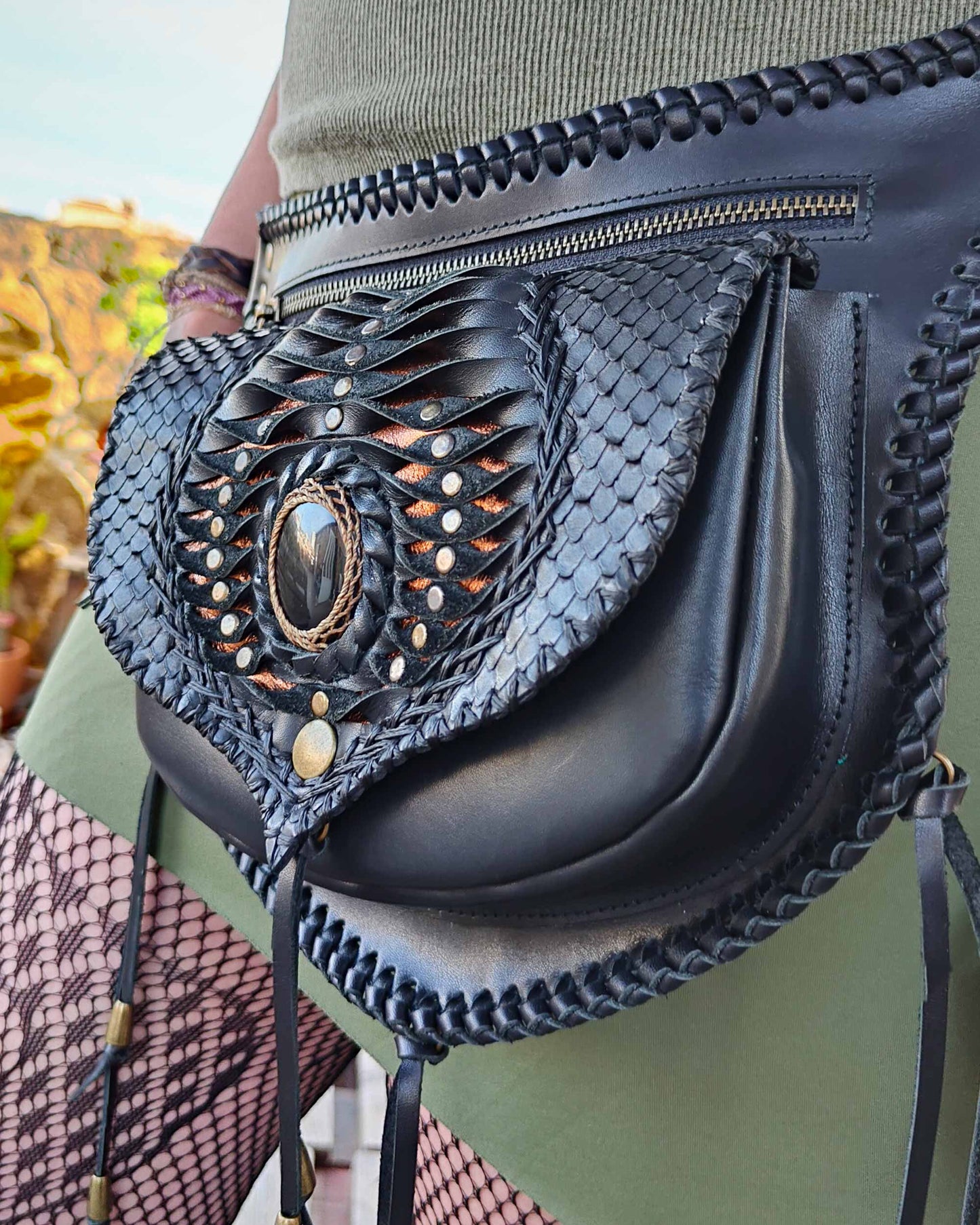 Artisan leather belt bag by Bohonito, featuring a unique interchangeable Kobra flap design on premium Black Boxcalf leather with edge lacing and obsidian.