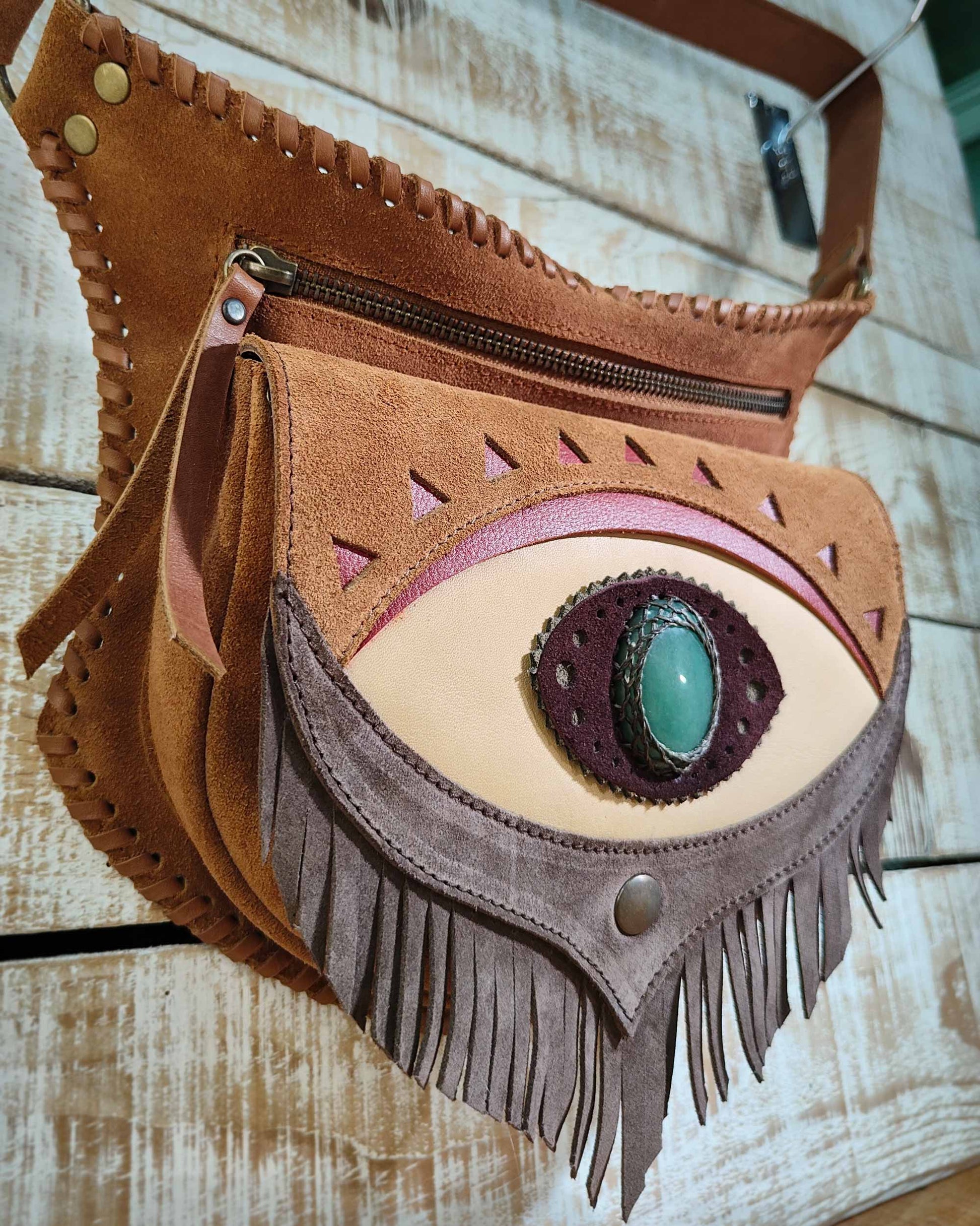 Handcrafted leather hip bag with off-white leather details, third eye Ajna inlay with natural polychrome jasper and artisanal lacing.
