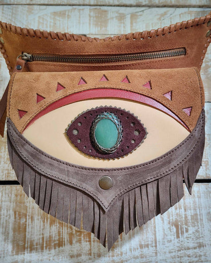 Boho style leather festival bag with  fringe, mystical Ajna eye featuring polychrome jasper and decorative hand-laced borders.