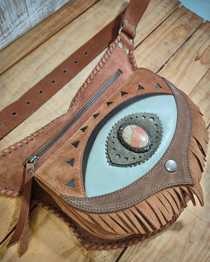 Brown and seafoam blue leather waist bag decorated with a natural polychrome jasper gemstone and decorative hand-stitched borders.