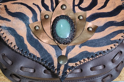 Hand-painted Tiger Loto design on a Bohonito brown buffalo leather belt bag featuring a natural Aventurine stone.
